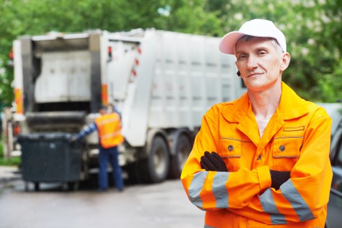 Company representative inspecting bin for complaint