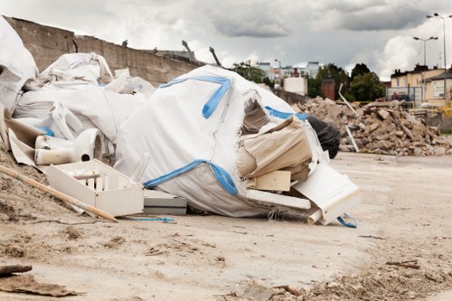 Person using a screen reader on a laptop while arranging commercial waste collection